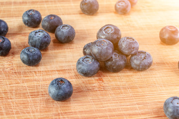 Blueberry on wood background