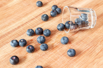 Blueberry on wood background