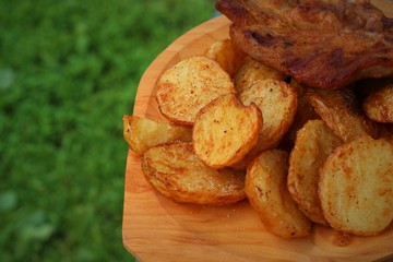 Grilled meat and fried potatoes