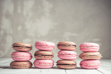 Stack of Raspberry and Chocolate pastel colored Macarons or Macaroons