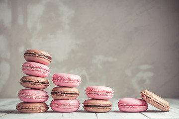 Stack of Raspberry and Chocolate pastel colored Macarons or Macaroons