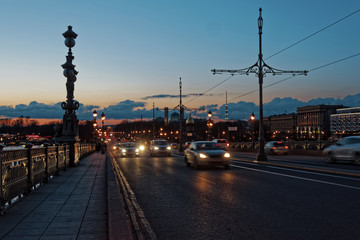 Night view of the Trinity Bridge over the Neva River. Saint-Petersburg, Russia.