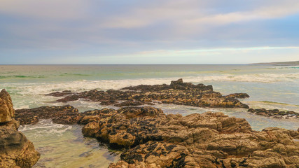 Rocks in the Ocean at the Beach in South Africa