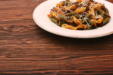 Pasta with meat, sauce and parmesan
