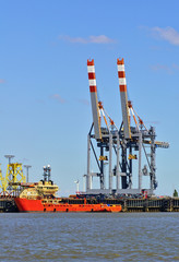 Port facilities with cranes and freight ship