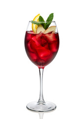 Cold sangria in a wine glass isolated on white. - obrazy, fototapety, plakaty