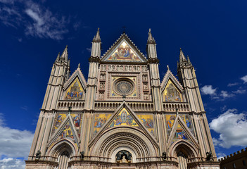 Fototapeta na wymiar Beautiful gothic facade of Orvieto Cathedral in Umbria, Italy