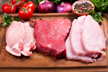 various meat on a wooden board