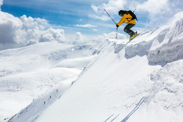 Fototapeta na wymiar good skiing in the snowy mountains, Carpathians, Ukraine, good winter day, incredible ski jump, ski season