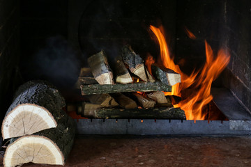 Burning firewood in the brazier.
