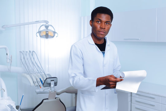 Black dentist in a dental clinic