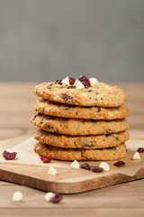 Fototapeta na wymiar Home Baked Oatmeal Cookies With White Chocolate And Cranberries.