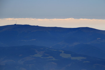Kralova Hola peak in the eastern ranges of Low Tatra National Park under layer of clouds, from Lomnicky peak, High Tatras, Slovakia, Europe © nogreenabove2k