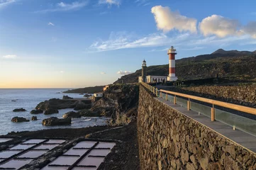 Foto op Plexiglas anti-reflex Salt pans and lighthouse of Fuencaliente in warm evening light, La Palma, Canary islands, Spain, Europe © dinkaspell
