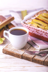 Traditional rhubarb pie with espresso coffee for breakfast.