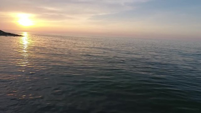 Shot of a beautiful summer sunset at the beach. Sunset at sea drone footage . Turkey duzce in akcakoca
