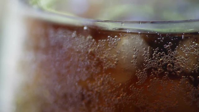 Bubbles from a carbonated soft drink