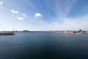 Fototapeta premium Copenhagen, the capital of Denmark. The picture is taken in the northeast part of the city. This is the Channel between the Amager island to the left, and the city center to the right. Wide angle.