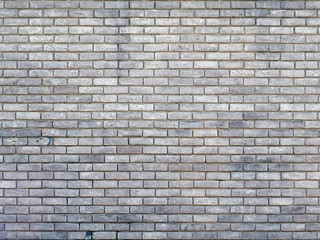 Fototapeta premium old brick wall with repeating pattern