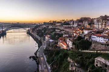 Douro River view Dom Luis I arch bridge connected cities of Porto (right) and Vila Nova de Gaia, Portugal