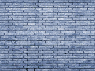 Fototapeta na wymiar blue toned brick wall repeating pattern