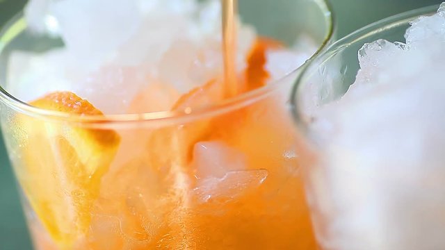Carbonated orange soda with crushed ice
