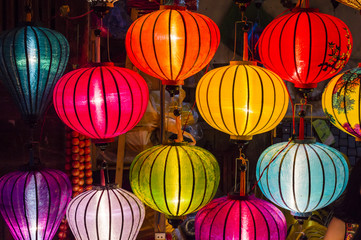 Colorful lanterns spread light on the old street of Hoi An Ancient Town, Quang Nam Province, Vietnam. UNESCO World Heritage Site