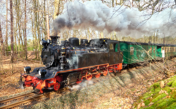 Historical steam train on island Rugen in Germany