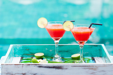 Strawberry margarita cocktail. Outdoor background