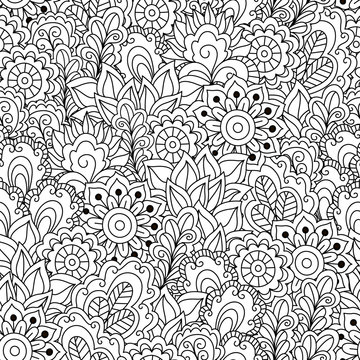 Seamless black and white background. Floral, ethnic, hand drawn elements for design. Good for coloring book for adults or design of wrapping and textile.