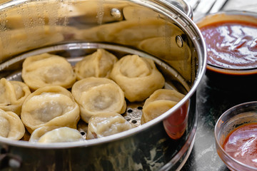 Khinkali, manti, pose, buzi, dumplings - a traditional meat dish of central Asia.