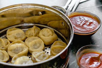 Khinkali, manti, pose, buzi, dumplings - a traditional meat dish of central Asia.