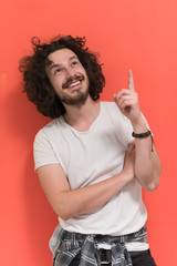 young man with funny hair over color background
