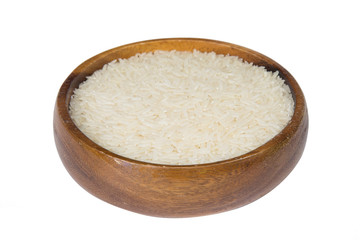 White rice (Thai Jasmine rice) in wooden bowl isolated on white background.