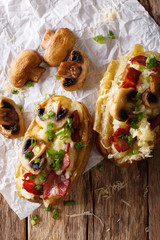 Potato baked with bacon, mushrooms and cheese macro. Vertical top view