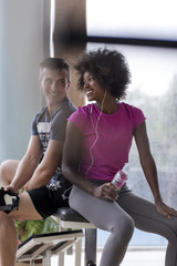 couple in a gym have break