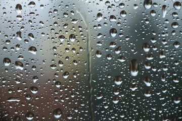 Rain drops on window , rainy day 