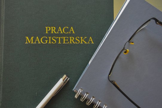 Master degree thesis will not be written by taking pictures of it. "Praca magisterska" means "master thesis".