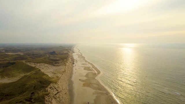  Drone areal shot of the western coastline of denmark spring on the edge of summer with bright sunshine