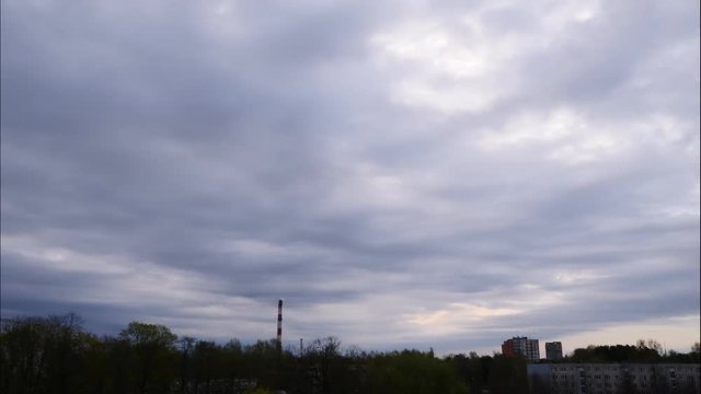 Sunrise Time Lapse Sky and moving clouds Power Plant pipe with smoke Latvia 4K