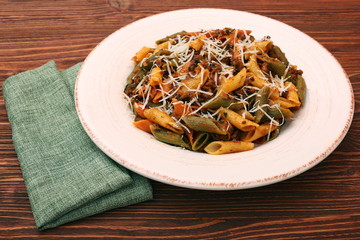 Pasta with meat, sauce and parmesan
