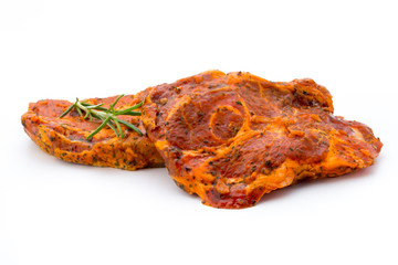 Pork chop, marinated. Isolated on the white background.