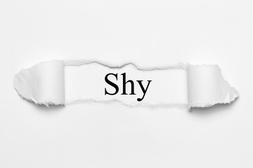 Shy on white torn paper