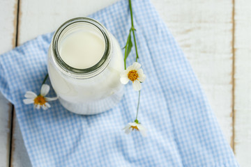 White milk. Fresh milk. Rural milk. A bottle of rustic