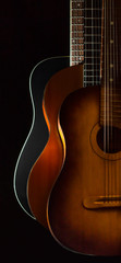 Fototapeta premium Three acoustic guitars on black background