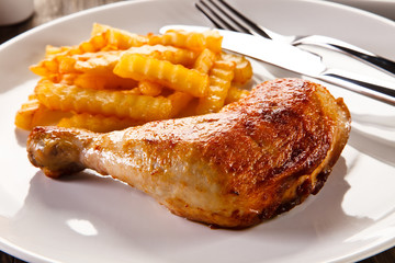 Roast chicken leg with french fries