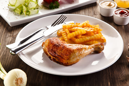 Roast chicken leg with french fries
