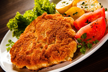 Fried pork chop with potatoes