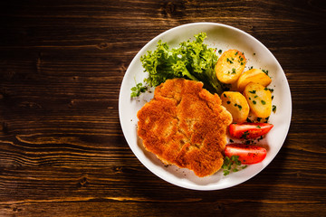 Fried pork chop with potatoes