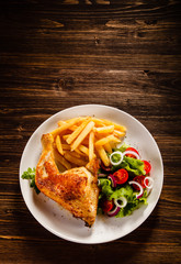 Roast chicken leg with french fries